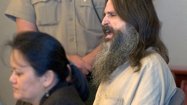 Brian David Mitchell sits with lawyer Vernice Trease, left, in Judge Judith Atherton's courtroom for his competency hearing Tuesday, May 24, 2005, in Salt Lake City. 
