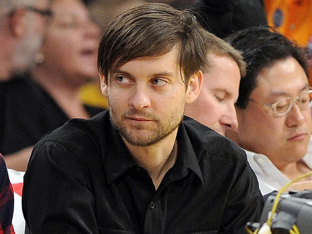 Actor Tobey Maguire looks on as he watches the Los Angeles Lakers play the Toronto Raptors in their NBA basketball game, Friday, Nov. 5, 2010, in Los Angeles. (AP Photo/Mark J. Terrill 