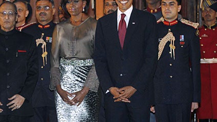 S. First Lady Michelle Obama, reacts, at Rashtrapati Bhavan, or President's Palace in New Delhi, India, Monday, Nov. 8, 2010. Indian and U.S. companies have discussed or signed over $14.9 billion in deals around Obama's trip, which will support 53,670 U.S 
