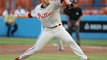 This May 29, 2010, file photo shows Philadelphia Phillies' Roy Halladay throwing a pitch during the first inning, enroute to a perfect game, against the Florida Marlins, in Miami.  