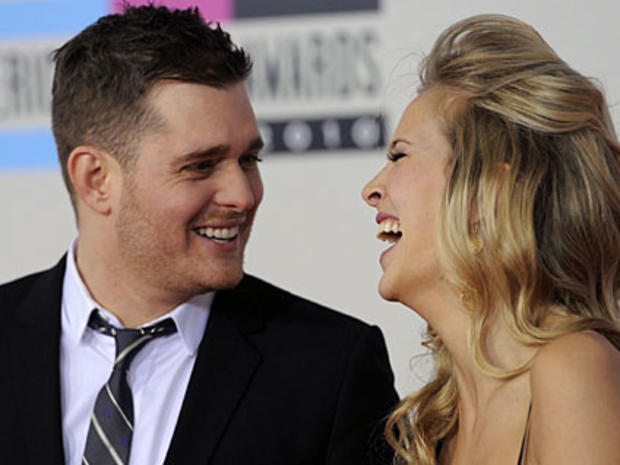 Buble, left, and Luisana Lopilato arrive at the 38th Annual American Music Awards on Sunday, Nov. 21, 2010 in Los Angeles. (AP Photo/Chris Pizzello) 