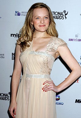 Actress and presenter Elisabeth Moss arrives at the 38th International Emmy Awards, Monday, Nov. 22, 2010, in New York. (AP Photo/ Louis Lanzano) 