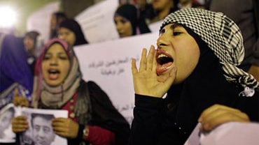 Protesters chant "Fraud" as they take part in a small demonstration of about 100 opposition activists in downtown Cairo, Egypt, Monday, Nov. 29, 2010. (AP Photo) 