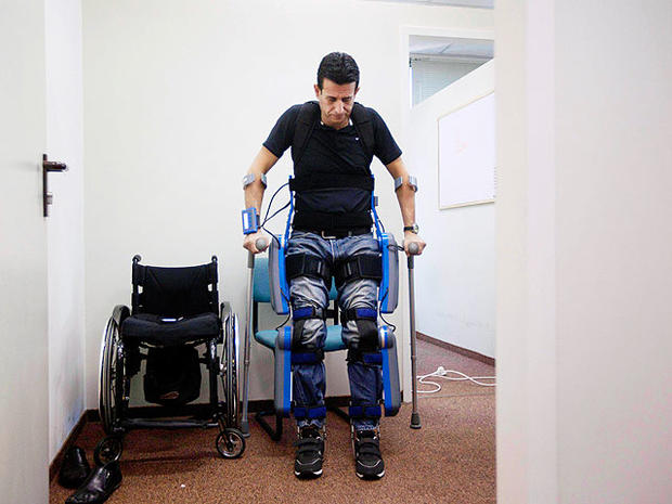 "ReWalks's" "bionic" legs help paralyzed walk. 