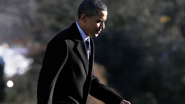 President Barack Obama returns to the White House in Washington 