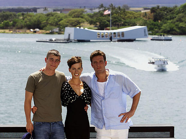 From left, Josh Hartnett, Kate Beckinsale, and Ben Affleck gather together on the flight deck of the aircraft carrier USS John C. Stennis Sunday, May 20, 2001, in preparation for the World Premiere of Touchstone Pictures' / Jerry Bruckheimer Films' PEARL HARBOR. Pictured in the background is the USS Arizona Memorial located in Pearl Harbor, Hawaii. (photo by Kevin Winter/Touchstone Pictures/Getty Images 