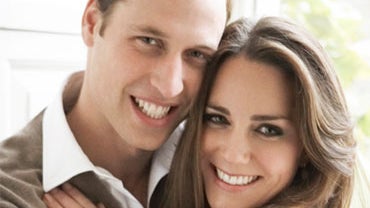 Prince William and Catherine Middleton pose in the Cornwall Room in St James's Palace, in an official portrait marking their engagement, released by Clarence House Press Office on December 11, 2010.  