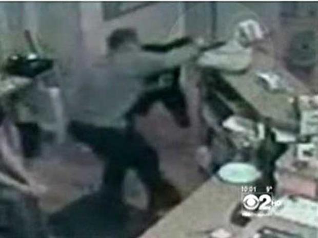 "Honeybee Killer" Case Closed? Surveillance Video Shows Customer Turning Gun on Robber 