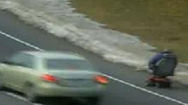 wtnh-wheelchair-on-interstate_20110107052042_640_480.JPG 