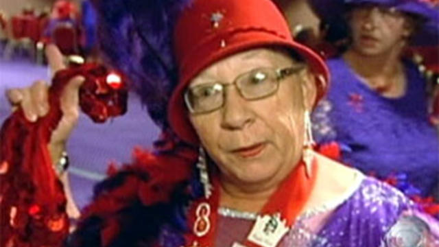 Roberta Kresleym shows off her "bling" at a recent convention of the Red Hat Society in Laughlin, Nev. 