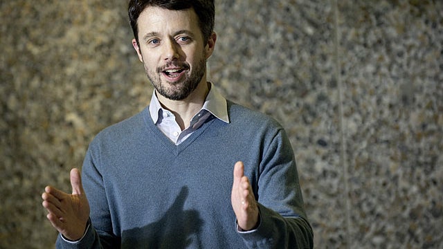 Danish Crown Prince Frederik gestures to show the size of his new born son and daughter, at Copenhagen Hospital, on January 8, 2011. Crown Princess Mary gave birth to twins on the morning of January 8, 2011 at Rigshospitalet in Copenhagen, the third and f 