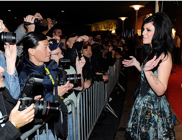 LAS VEGAS, NV - JANUARY 08: Adult film actress Andy San Dimas greets fans as she arrives at the 28th annual Adult Video News Awards Show at the Palms Casino Resort January 8, 2011 in Las Vegas, Nevada. (Photo by Ethan Miller/Getty Images) 