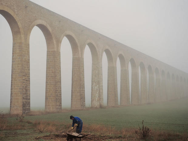 Fog covers an ancient aqueduct at Noain, northern Spain,  Jan. 14, 2011. 