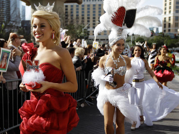 Miss America contestants wait for the start of the "Show Us Your Shoes" parade, Jan. 14, 2011, in Las Vegas. 