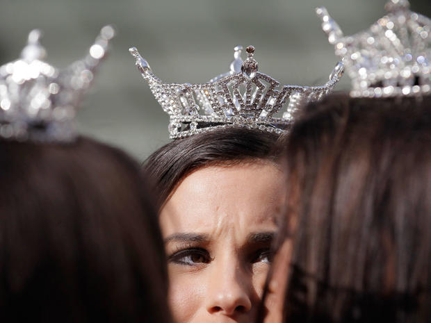 Miss America contestants wait for the start of the "Show Us Your Shoes" parade, Jan. 14, 2011, in Las Vegas.  