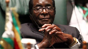 Robert Mugabe, President of the Republic of Zimbabwe, attends a joint Arab-African summit in the Libyan coastal city of Sirte on October 10, 2010. AFP PHOTO/KHALED DESOUKI (Photo credit should read KHALED DESOUKI/AFP/Getty Images) 