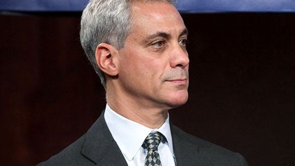 White House Chief of Staff Rahm Emanuel listens to U.S. President Barack Obama speak to the media before departing the White House on June 25, 2010 in Washington, DC. President Obama is traveling to Muskoka, Canada to attend the G-8 and G-20 Summits. (Pho 