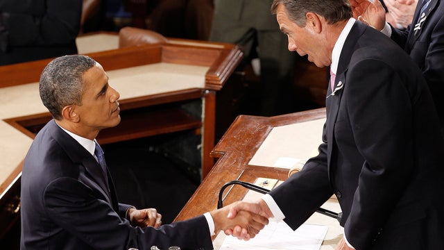 U.S. President Barack Obama shakes hands with Speaker of the House John Boehner 