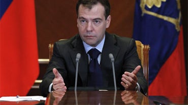 Russian President Dmitry Medvedev gestures as he heads a meeting on economic issues at the Gorki presidential residence outside Moscow on Friday, Jan. 28, 2011.  