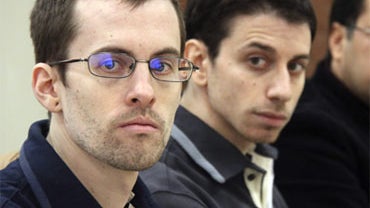 A photo released by Iran's state-run Press TV shows U.S. hikers Shane Bauer (left) and Josh Fattal during the first session of their trial at the Tehran Revolutionary Court, February 6, 2011. 