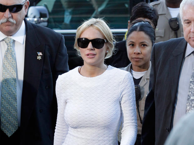 ctress Lindsay Lohan, center, arrives at the LAX Airport Courthouse in Los Angeles 