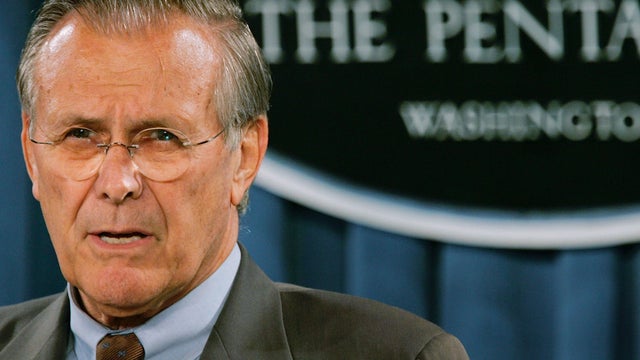 Donald Rumsfeld speaks during a news briefing 
