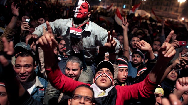 Egyptians celebrate the news of the resignation of President Mubarak 