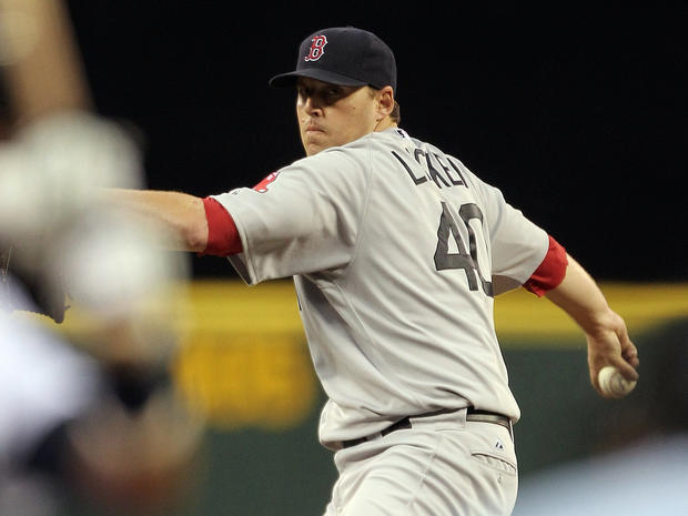 John Lackey pitches against the Mariners 
