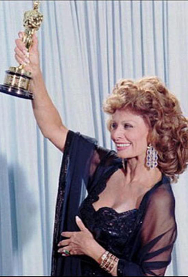Italian actress Sophia Loren holds aloft the Oscar she  won in 1961 for  her  role in "Two Women." 