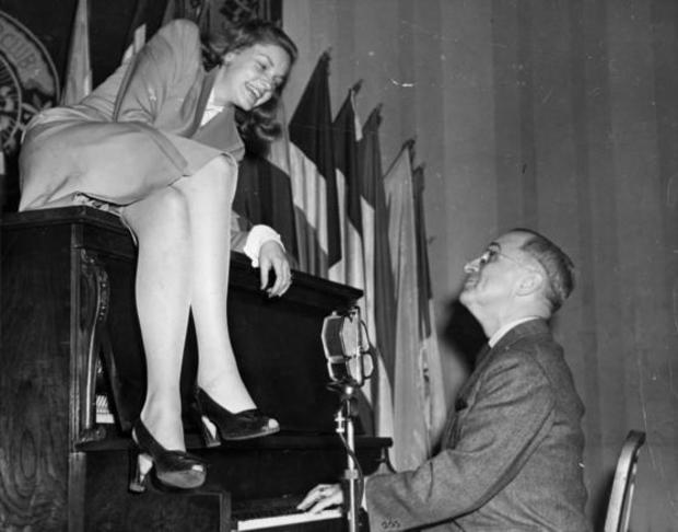 actress-lauren-bacall-sits-atop-the-piano-while-vice-president-harry-s-truman-plays-the-piano-at-the-national-press-club-canteen-trumanlibraryorg.jpg 