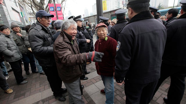 China protesters told to go home 