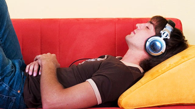 lazy, teen, boy, music, headphones, exercise, stock, 4x3 