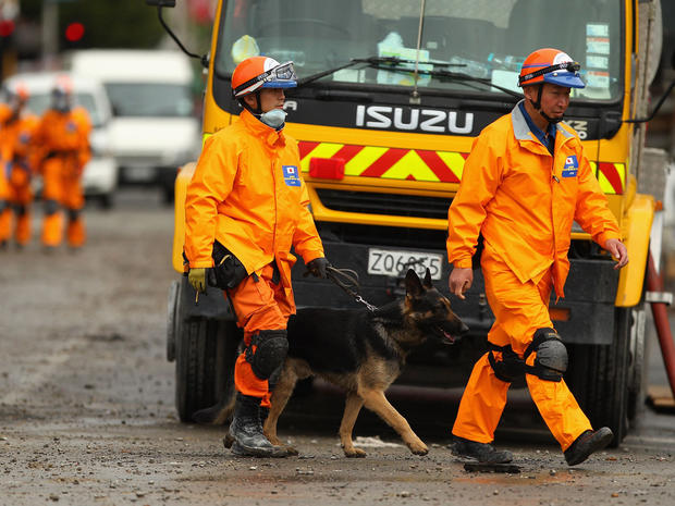 Japanese search and rescue workers at the site of the CTV buidling  