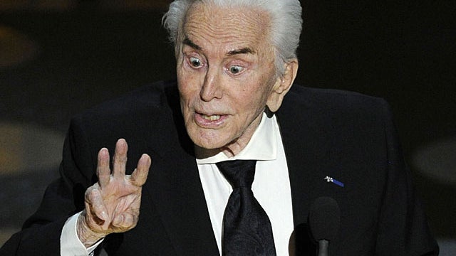 Actor Kirk Douglas presents the award for best supporting actress during the 83rd Academy Awards on Sunday, Feb. 27, 2011, in the Hollywood section of Los Angeles. (AP Photo/Mark J. Terrill 