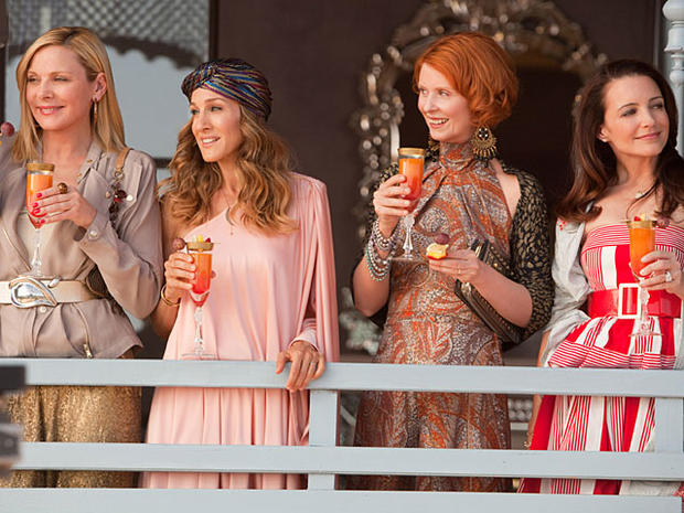 FILE - In this undated file photo originally provided by Warner Bros., from left, actresses Kim Cattral as Samantha Jones, Sarah Jessica Parker as Carrie Bradshaw, Cynthia Nixon as Miranda Hobbes and Kristin Davis as Charlotte York are shown in a scene fr 