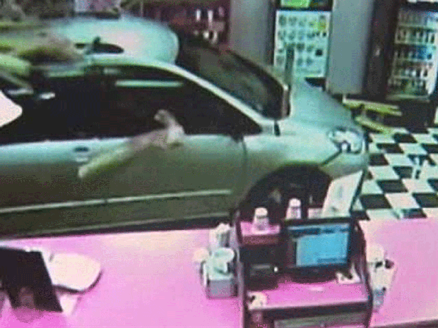 Woman drives minivan into Boston coffee shop 