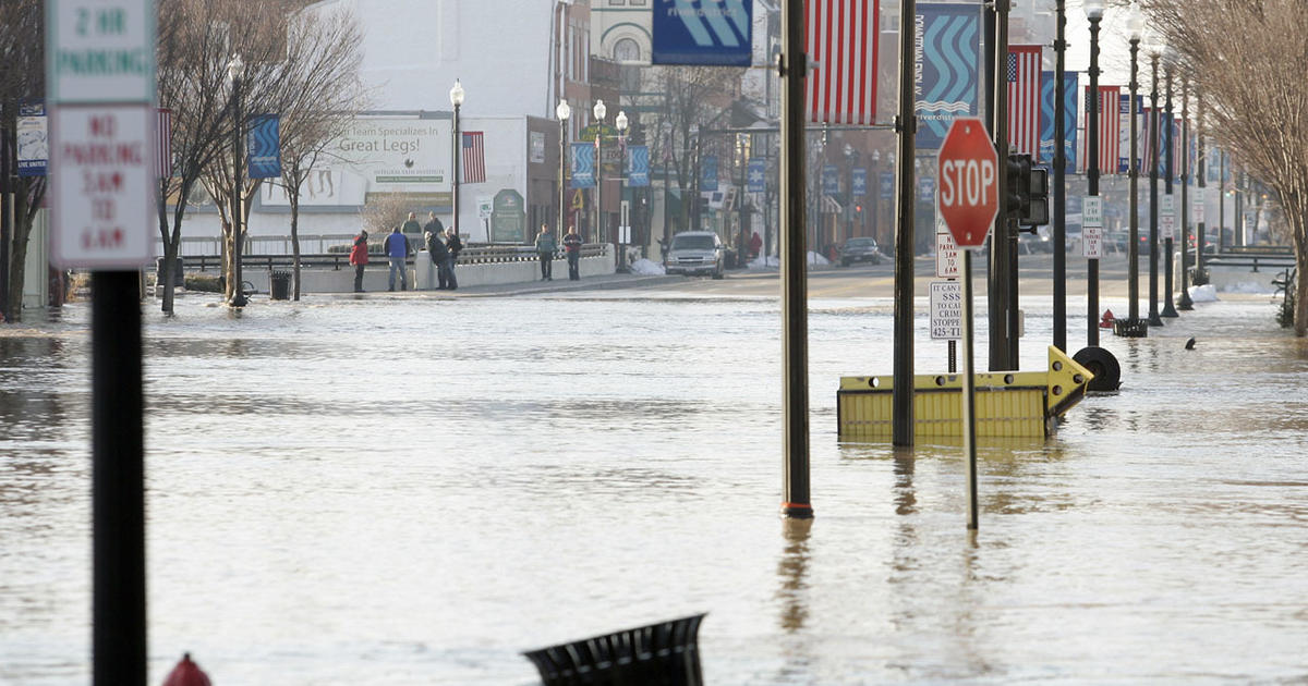 Flooding revisits past-inundated Ohio city - CBS News