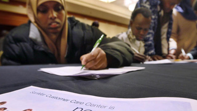 Mariam Bario fills out a job application 