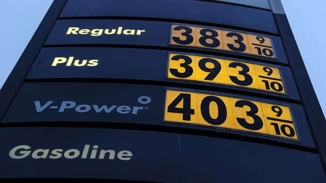 A sign shows gasoline prices at a gas station in Carson, California March 2, 2011. 