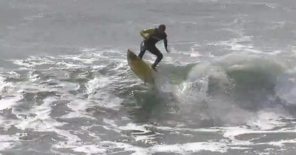 wow-zoltan-torkos-performs-amazing-kickflip-on-a-surfboard-cbs-news