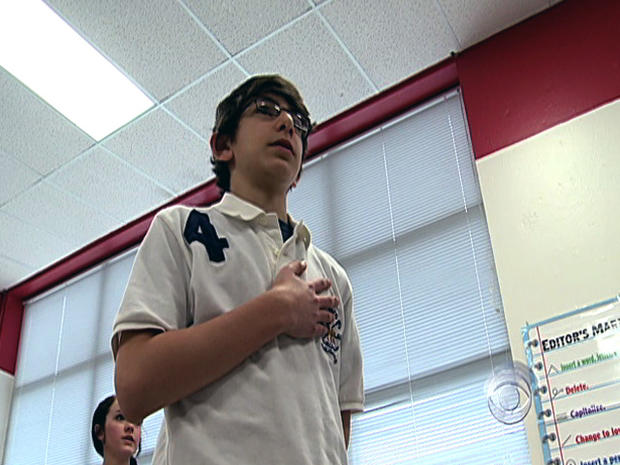 14-year-old Salim Sbenaty pledges allegiance in Murfreesboro, Tenn. 