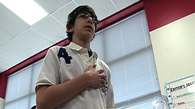 14-year-old Salim Sbenaty pledges allegiance in Murfreesboro, Tenn. 