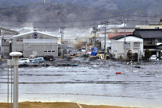 Tsunami washes through Miyagi Prefecture, Japan 