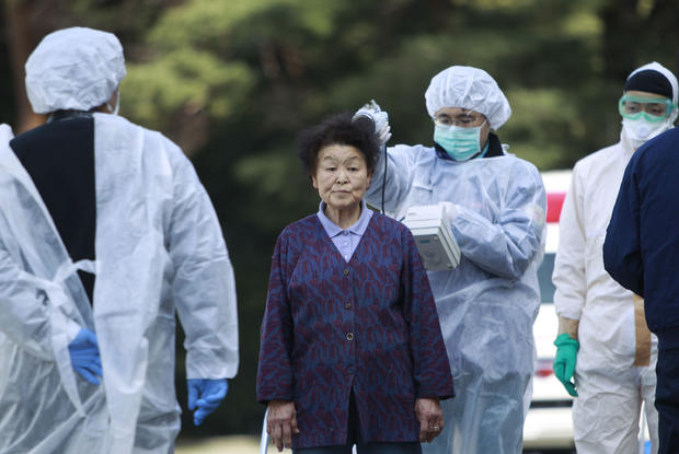 Residents checked for radiation contamination near Fukushima plant 