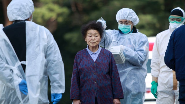 Residents checked for radiation contamination near Fukushima plant 