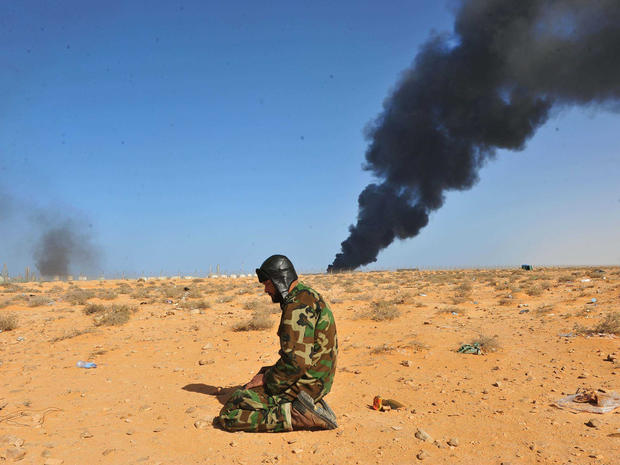 Government troops drove opposition forces out of the strategic oil town Ras Lanuf, Libya. 