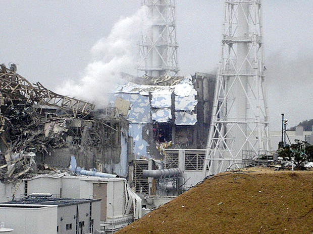 Smoke rises from the Fukushima Dai-ichi nuclear complex 