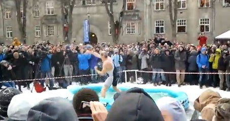 St. Patrick's Day Splash: Darren Taylor dives into 30 cm of water for ...