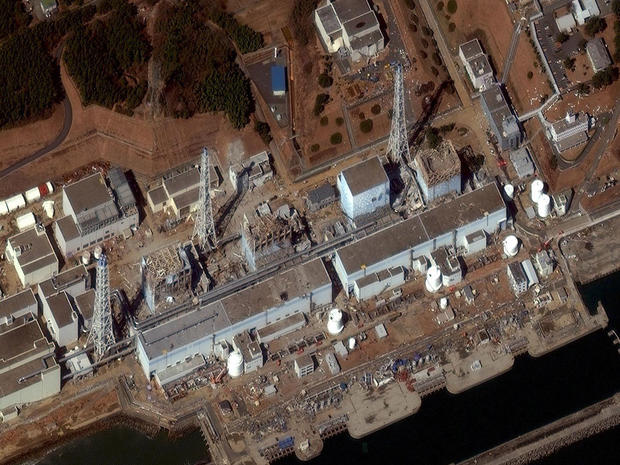 Fukushima Dai-ichi nuclear plant, March 18, 2011, with damaged reactors clearly visible. 