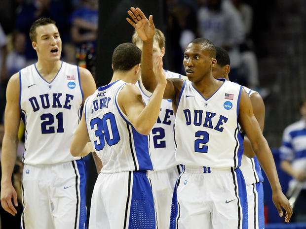 Nolan Smith of the Duke reacts in the second half with teammates 